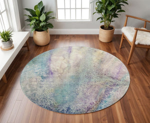 HomeRoots 8' Vibrant Blue, Purple & Ivory Abstract Round Rug – Washable, UV-Protected for Modern Spaces! 646771