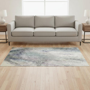 HomeRoots 5' X 8' Abstract Ivory and Purple Area Rug - Washable, UV Protected, Stain-Resistant for Modern Homes 646782