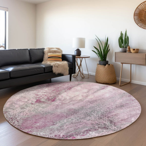 HomeRoots 8' Pink And Ivory Abstract Washable Round Rug with Stain Resistance and UV Protection for Modern Spaces 646795