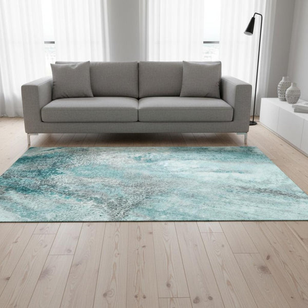 HomeRoots 5' X 8' Teal & Ivory Abstract Area Rug - Washable, UV-Protected, Stain-Resistant for Modern Homes 646806