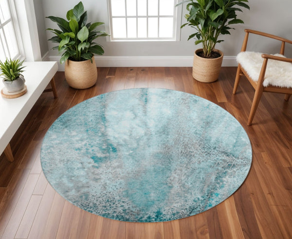HomeRoots 8' Teal And Ivory Abstract Washable Round Rug - Stylish, Stain-Resistant, UV Protected for High Traffic Areas 646807
