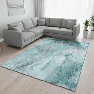 HomeRoots 8' X 10' Teal & Ivory Abstract Washable Area Rug - Durable, UV-Protected for Homes with Kids & Pets 646808