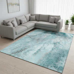 HomeRoots 10' X 14' Teal and Ivory Abstract Washable Area Rug – Stain-Resistant, UV Protected, Durable Design 646810