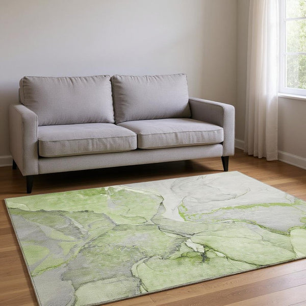 HomeRoots 5' X 8' Contemporary Abstract Washable Area Rug in Green, Gray & Ivory with UV Protection Features 646824