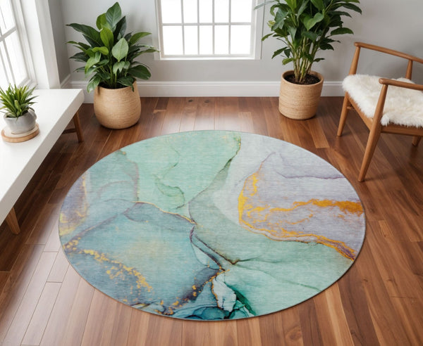 HomeRoots 8' Teal Gold Ivory Abstract Washable Round Rug – Durable, Stain-Resistant, UV Protected, Stylish Home Décor 646843