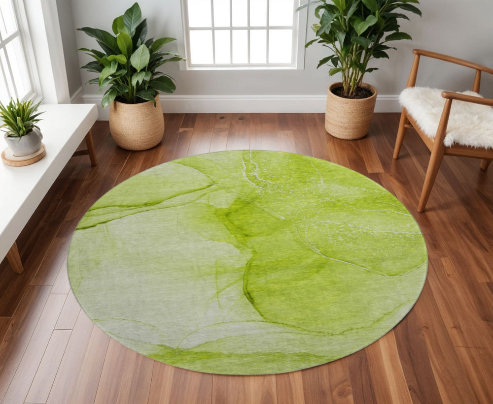 HomeRoots 8' Green and Ivory Abstract Round Rug - Washable, UV-Protected, Durable Design for High-Traffic Spaces 646861