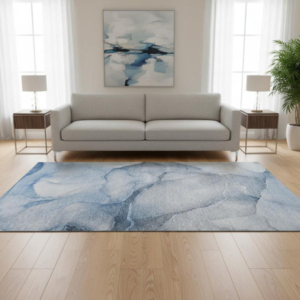 HomeRoots 5' Blue and Ivory Abstract Area Rug – Washable, Stain Resistant, UV Protected for Modern Homes 646896