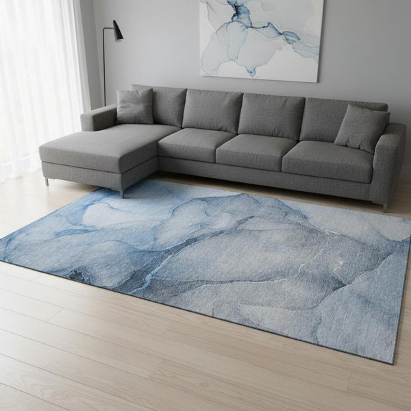 HomeRoots 9' X 12' Blue and Ivory Abstract Area Rug - Washable, UV-Protected, Durable & Kid-Friendly Design 646899