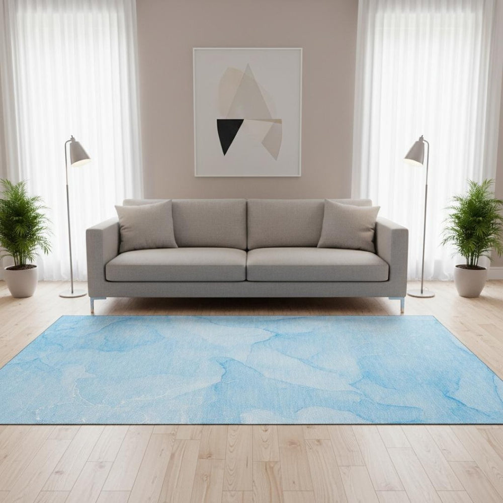 HomeRoots 5' X 8' Abstract Blue and Ivory Area Rug - Washable, Stain Resistant, UV Protected for Busy Homes 646932