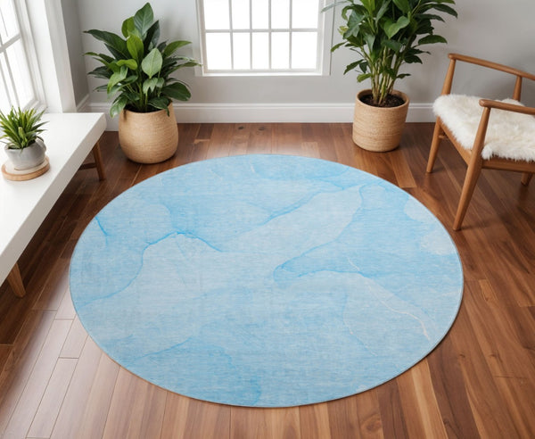 HomeRoots 8' Blue And Ivory Abstract Round Rug - Washable, UV Protected, Perfect for High-Traffic Spaces 646933
