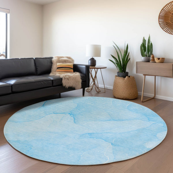 HomeRoots 8' Blue And Ivory Abstract Round Rug - Washable, UV Protected, Perfect for High-Traffic Spaces 646933