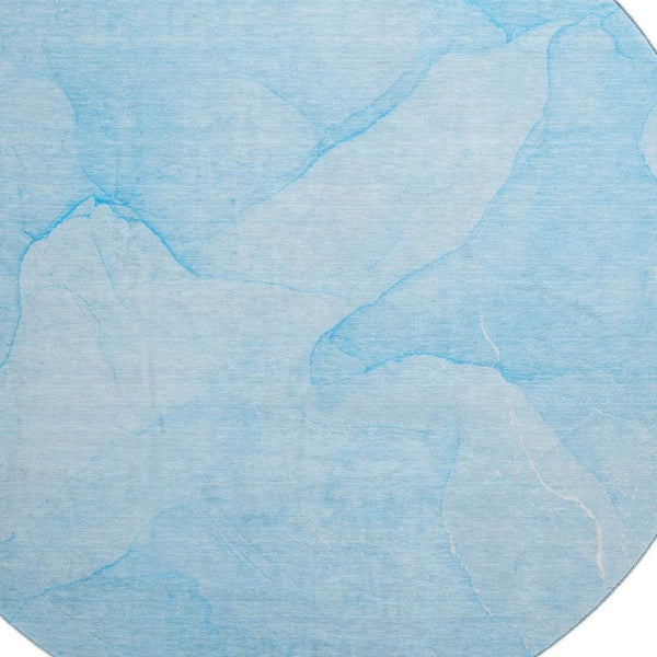 HomeRoots 8' Blue And Ivory Abstract Round Rug - Washable, UV Protected, Perfect for High-Traffic Spaces 646933
