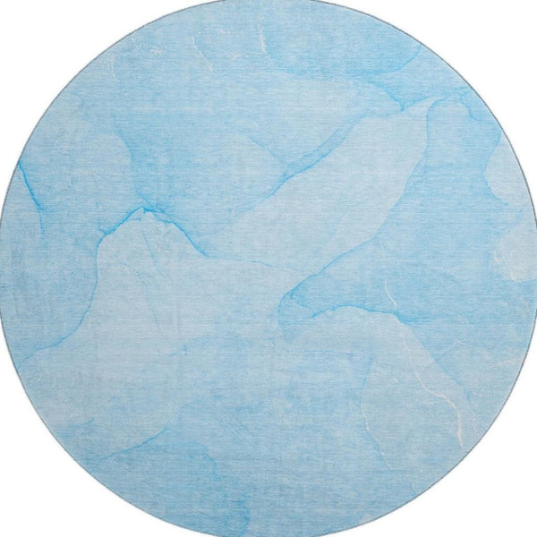 HomeRoots 8' Blue And Ivory Abstract Round Rug - Washable, UV Protected, Perfect for High-Traffic Spaces 646933
