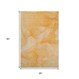 HomeRoots 5' X 8' Orange And Ivory Abstract Area Rug - Washable, UV Protected, Perfect for High-Traffic Rooms! 646944