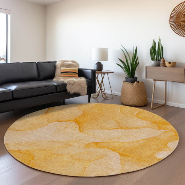 HomeRoots 8' Abstract Orange and Ivory Washable Round Rug with UV Protection for Durable, Low-Maintenance Style 646945