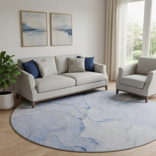 HomeRoots 8' Blue and Ivory Abstract Washable Round Rug - Stain Resistant, UV Protected, Ideal for Busy Homes 646957