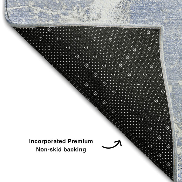 HomeRoots 9' X 12' Blue And Ivory Abstract Area Rug - Washable, UV Protected, Stain Resistant for High-Traffic Areas 646959