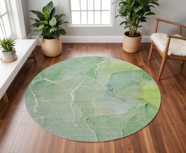 HomeRoots 8' Green and Ivory Abstract Round Rug - Durable, Washable, UV-Protected, Perfect for High-Traffic Areas 646981