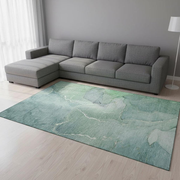 HomeRoots 9' X 12' Teal and Ivory Abstract Area Rug - Durable, Washable, UV Protected for Modern Living Spaces 646995