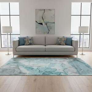 HomeRoots 5' Teal and Ivory Abstract Area Rug - Washable, UV Protected, Durable for High-Traffic Spaces! 647010
