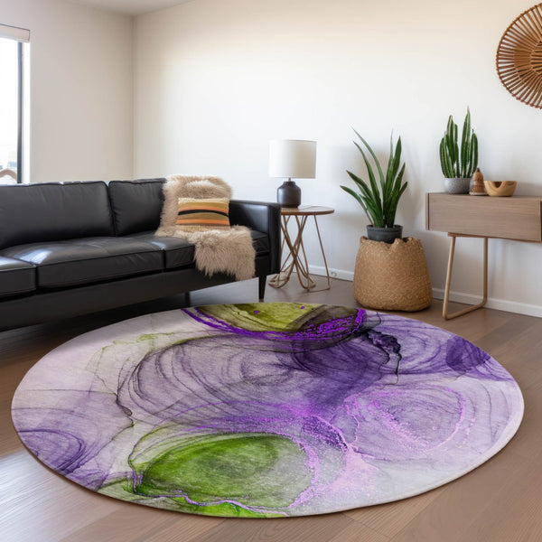 HomeRoots 8' Vibrant Purple, Green & Ivory Abstract Round Rug - Washable, UV Protected, Stain Resistant Design 647047
