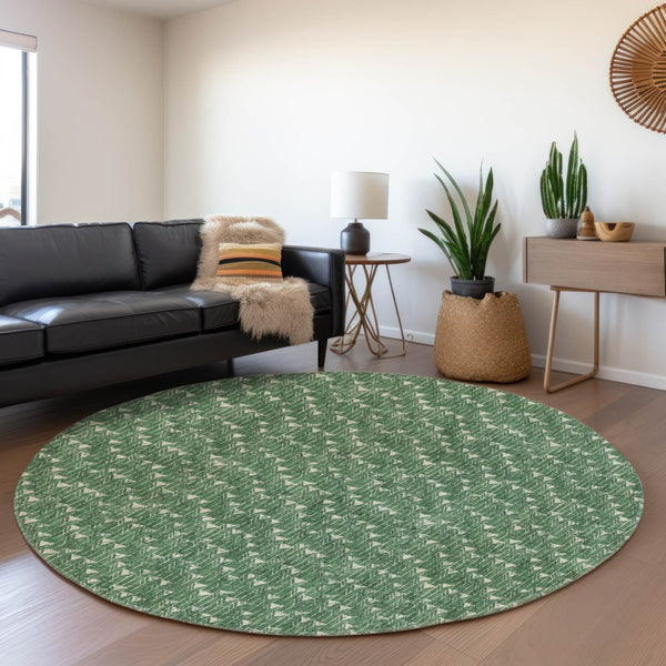 HomeRoots 8' Green and Ivory Geometric Round Rug - Washable, UV Protected, Durable for Indoor and Outdoor Use 647095