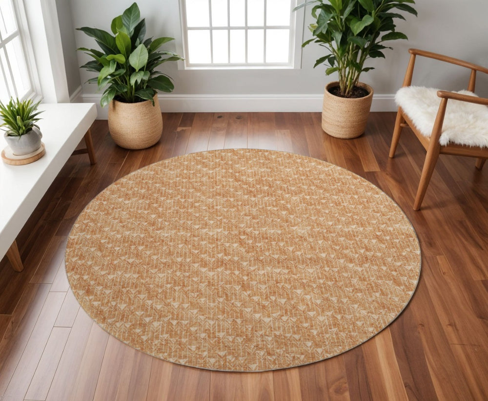 HomeRoots 8' Salmon and Ivory Geometric Round Rug - Washable, UV Protected, Durable for High-Traffic Spaces 647113