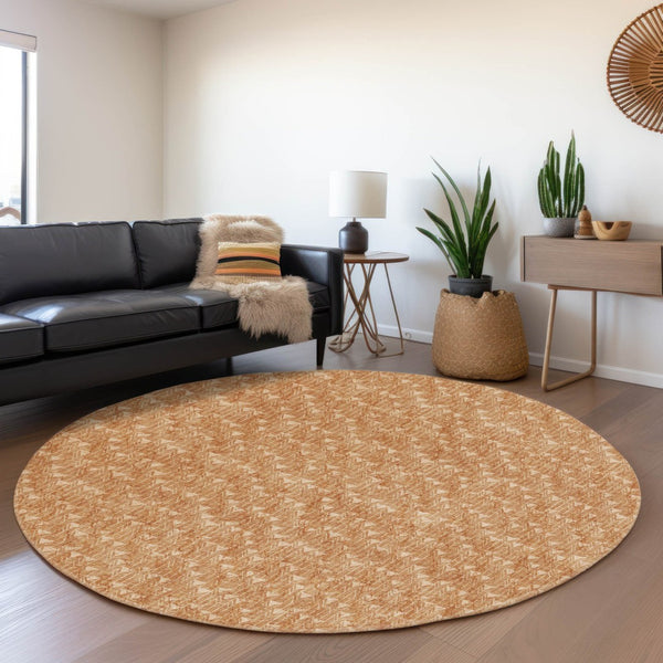 HomeRoots 8' Salmon and Ivory Geometric Round Rug - Washable, UV Protected, Durable for High-Traffic Spaces 647113
