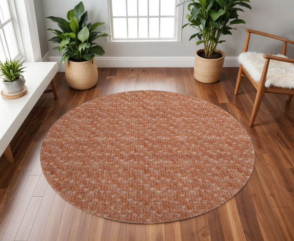 HomeRoots 8' Terra Cotta and Ivory Geometric Round Rug - Washable, UV Protected, Perfect for Family Living Spaces! 647125
