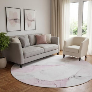 HomeRoots 8' Pink And Ivory Abstract Round Rug - Washable, UV Protected, Stain Resistant for Stylish Living Spaces 647149