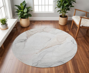 HomeRoots 8' Ivory and Beige Abstract Round Rug - Washable, UV-Protected, Stain-Resistant, Modern Elegance 647155