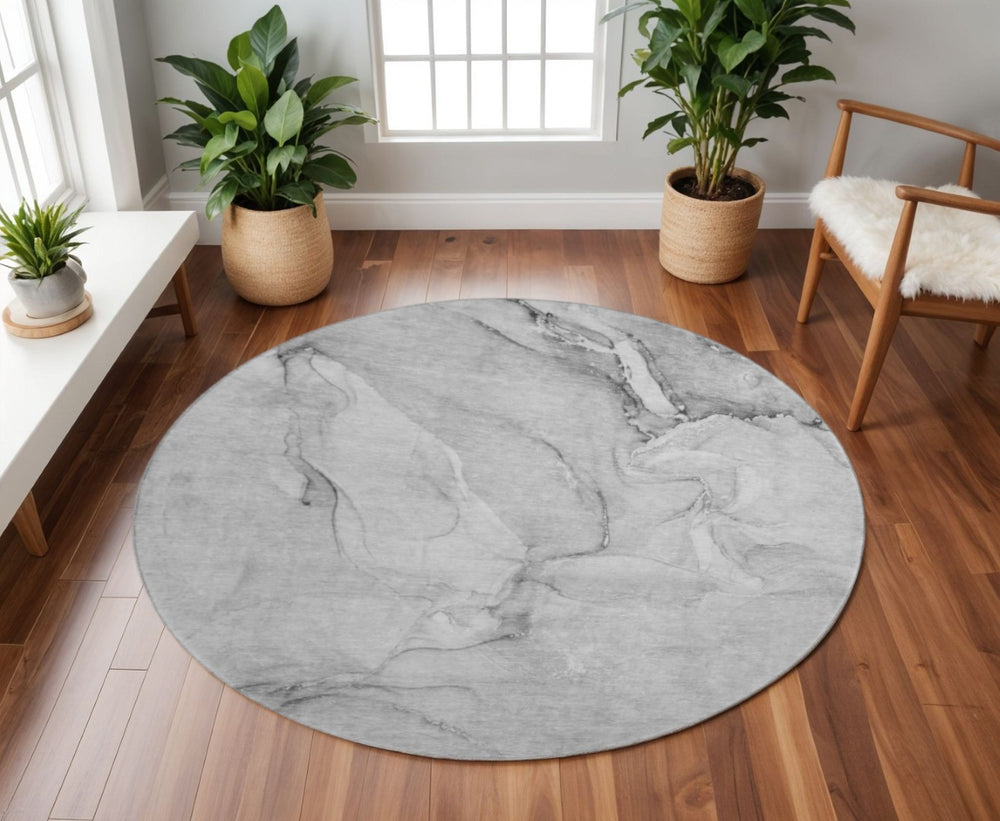 HomeRoots 8' Gray and Ivory Abstract Washable Round Rug – Durable, UV-Protected, Stain-Resistant Beauty for Any Room 647167