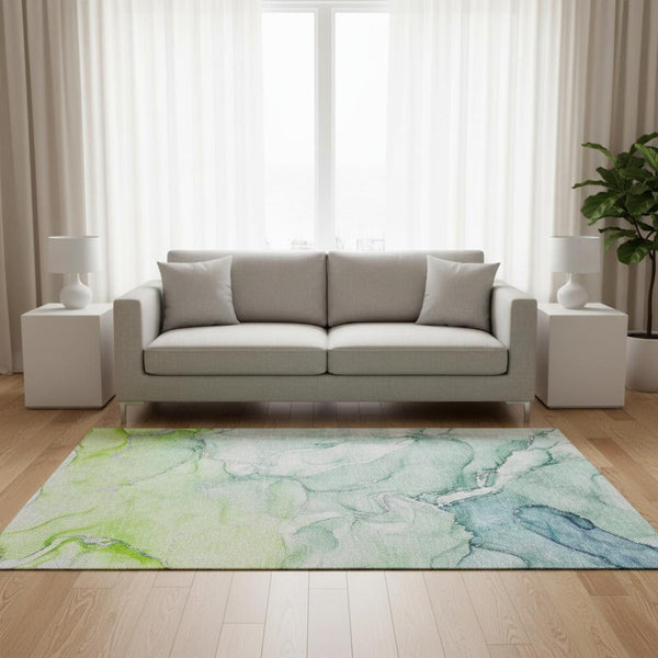 HomeRoots 5' X 8' Abstract Area Rug in Green, Blue & Ivory – Washable, UV-Protected, Durable & Stylish Design 647172