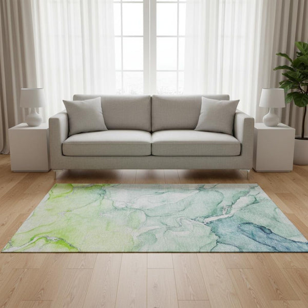 HomeRoots 5' X 8' Abstract Area Rug in Green, Blue & Ivory – Washable, UV-Protected, Durable & Stylish Design 647172