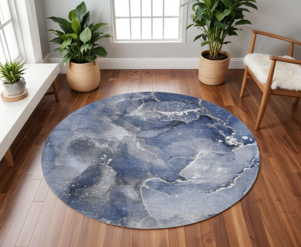HomeRoots 8' Navy Blue and Ivory Abstract Washable Round Rug - Stylish, Durable, and UV-Protected for Any Space 647239