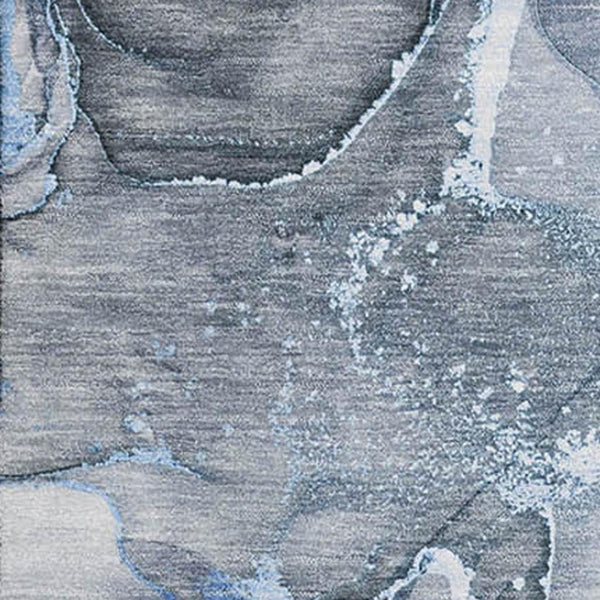 HomeRoots 9' X 12' Blue And Ivory Abstract Washable Area Rug - Durable, Stylish, UV-Protected for Any Space! 647259