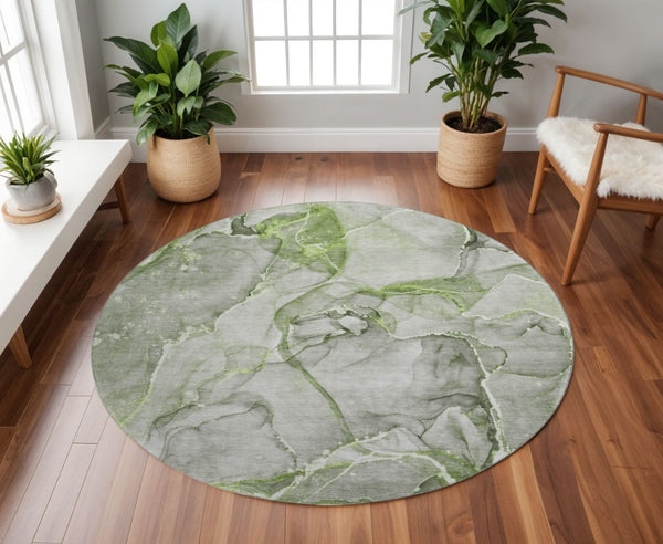 HomeRoots 8' Green And Ivory Abstract Round Washable Rug - Durable, UV Protected, Modern Style for Any Space 647269