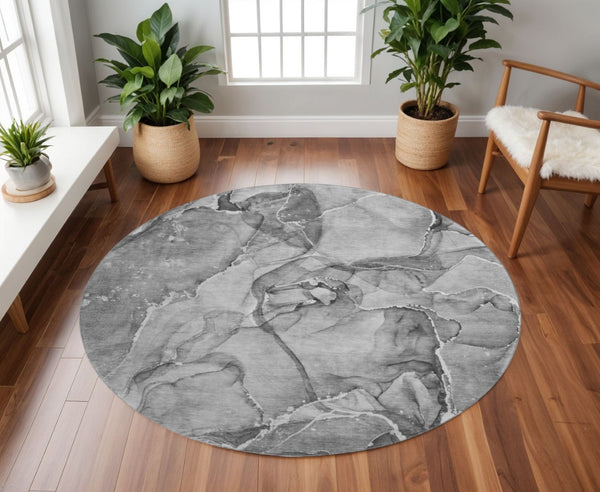 HomeRoots 8' Stylish Pewter and Ivory Abstract Washable Round Rug with Stain Resistance and UV Protection 647275