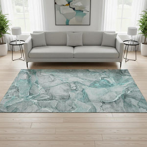 HomeRoots 5' X 8' Teal and Ivory Abstract Washable Area Rug with UV Protection - Stylish, Durable & Easy Care! 647280