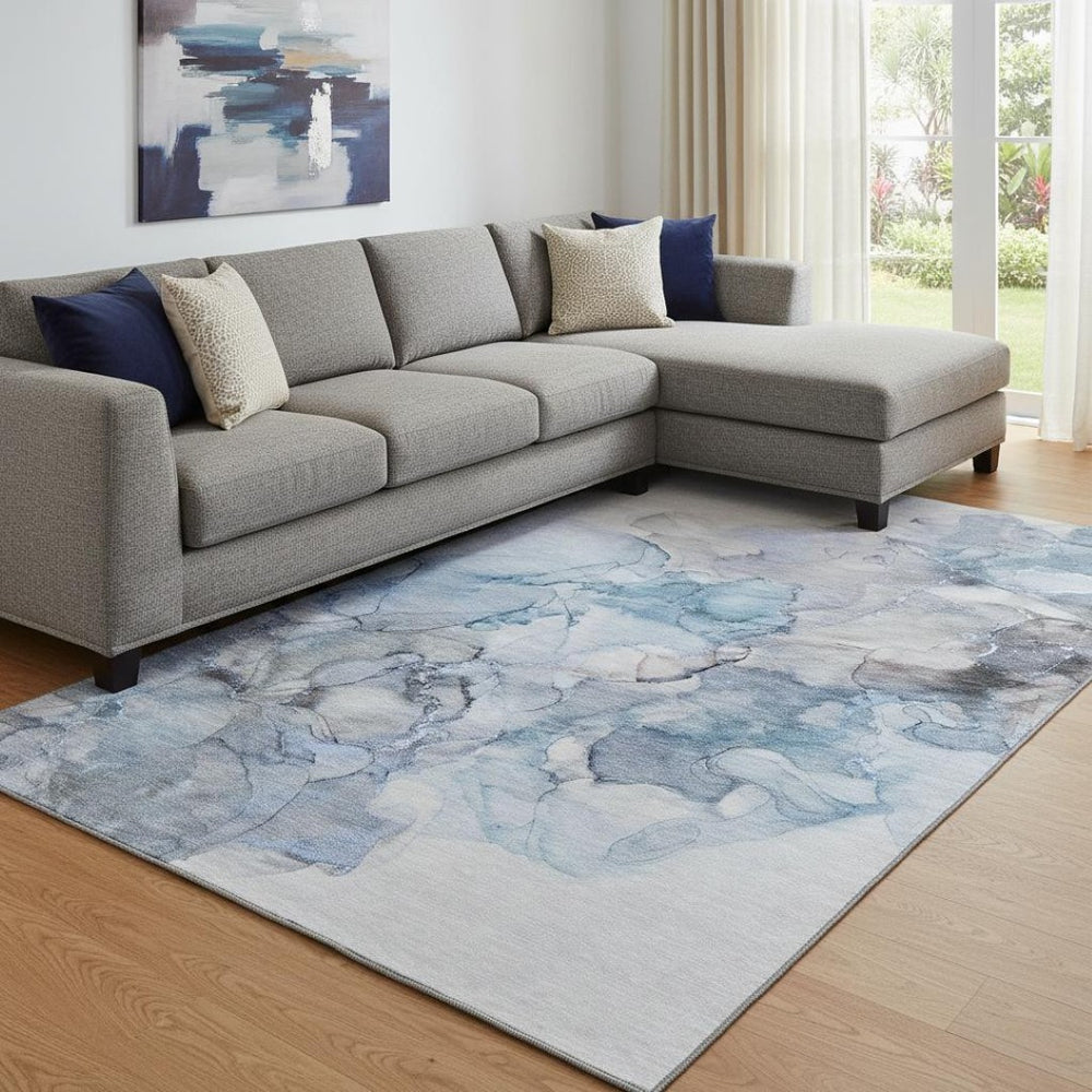 HomeRoots 9' X 12' Abstract Blue-Gray and Ivory Washable Area Rug with UV Protection for Family Homes 647295