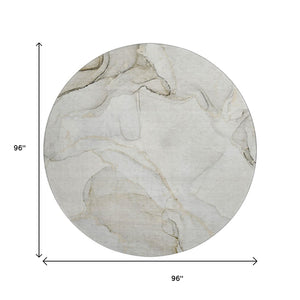 HomeRoots 8' Beige And Ivory Abstract Round Rug - Washable, UV Protected, Stain Resistant for High-Traffic Areas 647389