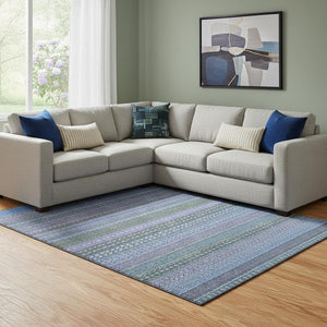 HomeRoots 9' X 12' Blue and Ivory Striped Washable Area Rug - Durable, UV-Protected, Perfect for Homes with Kids 647493