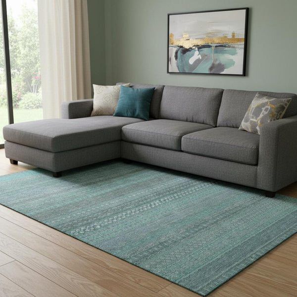 HomeRoots 9' X 12' Coastal Turquoise & Ivory Striped Washable Area Rug with Stain Resistance & UV Protection 647559