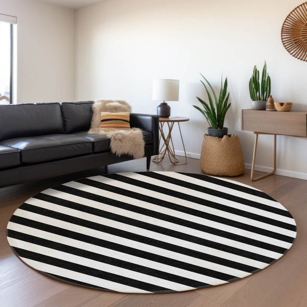 HomeRoots 8' Black And Ivory Striped Round Rug - Washable, UV Protected, Durable, Perfect for Any Space! 647563