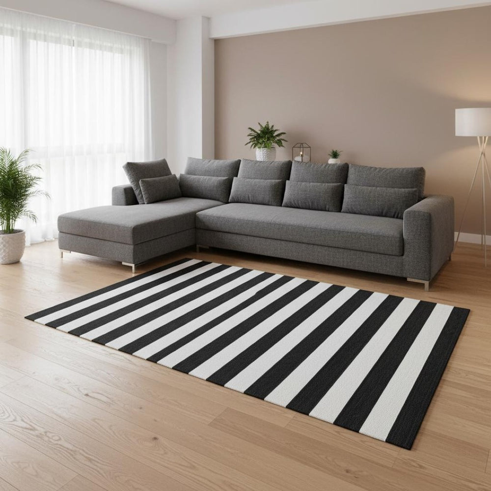 HomeRoots 8' X 10' Black And Ivory Striped Area Rug - Durable, Washable, UV-Protected for High-Traffic Spaces 647564