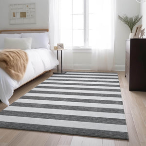 HomeRoots 10' Charcoal and Ivory Striped Washable Area Rug - Durable, UV Protected, Perfect for High-Traffic Spaces! 647572