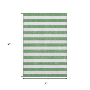 HomeRoots 5' X 8' Washable Area Rug in Green and Ivory Stripes – Stain Resistant, UV Protected, Durable Design 647592