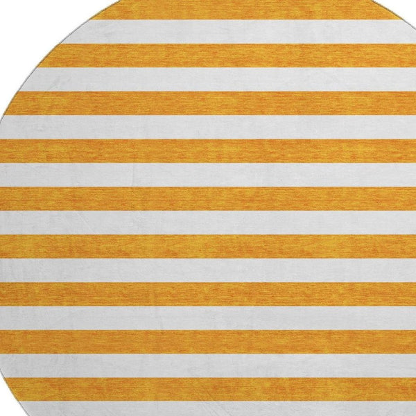 HomeRoots 8' Washable Round Rug in Bold Orange and Ivory Stripes – UV Protected, Stain Resistant, Durable Design 647623