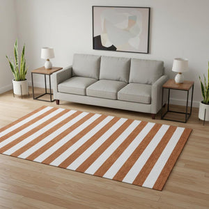 HomeRoots 5' X 8' Striped Washable Area Rug in Rust and Ivory - Durable, Stain-Resistant, UV Protected Design 647628