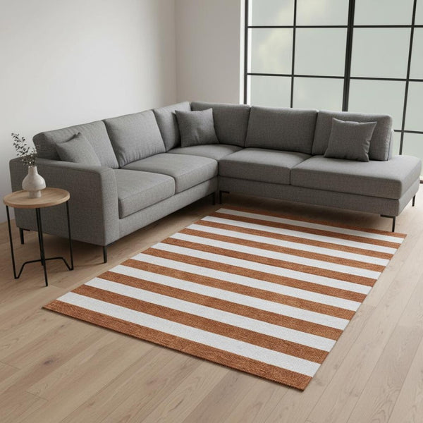 HomeRoots 8' X 10' Washable Rust and Ivory Striped Area Rug with UV Protection – Perfect for High-Traffic Spaces! 647630